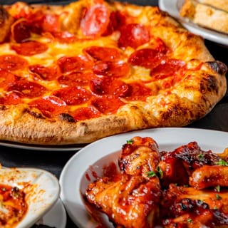 2 X-Large Pizza, 20 Wings & 2 Liter Soda Special