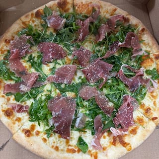 NY Style White Pizza - Topped with Arugula and Prosciutto