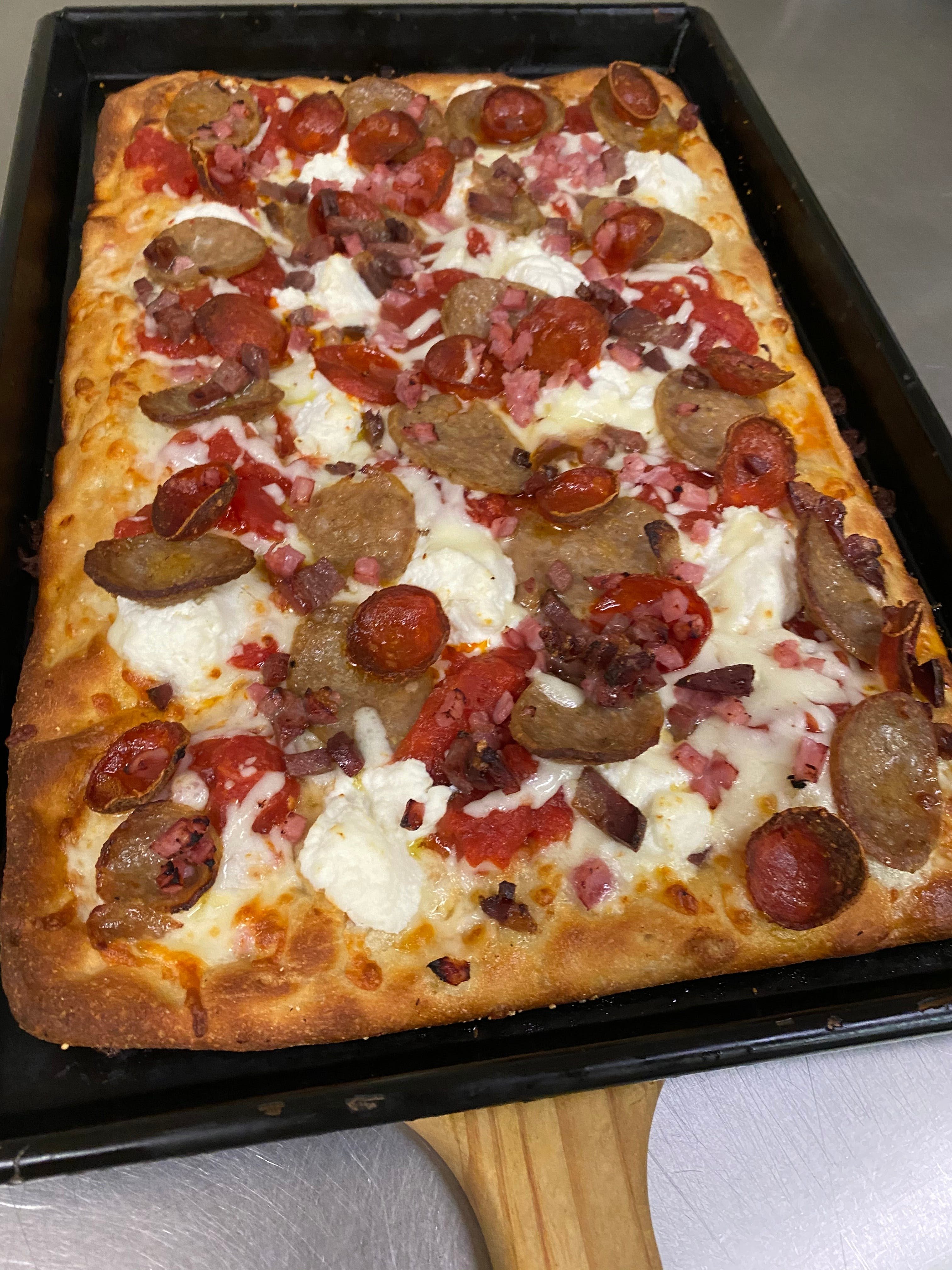 Italian Quattro Meat Roman Style Pan Pizza.